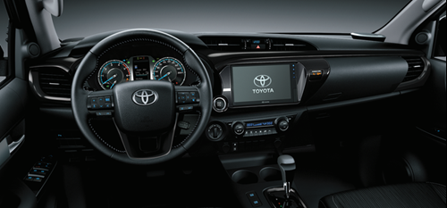 Khoang lái rộng rãi của Toyota Hilux 2024 kết hợp với thiết kế thể thao, cùng khu vực điều khiển trung tâm